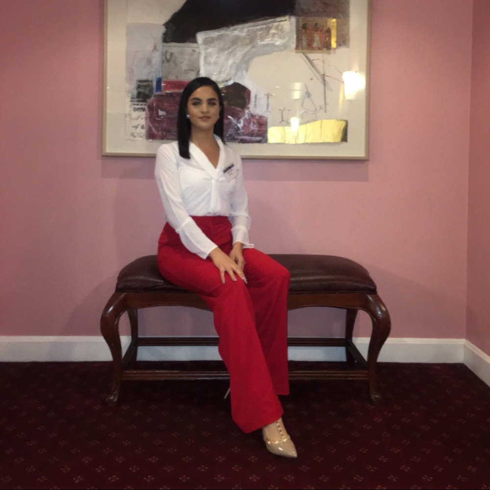 Red high-waisted flared dress pants